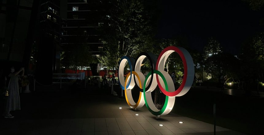 Olympics logo lit up at night