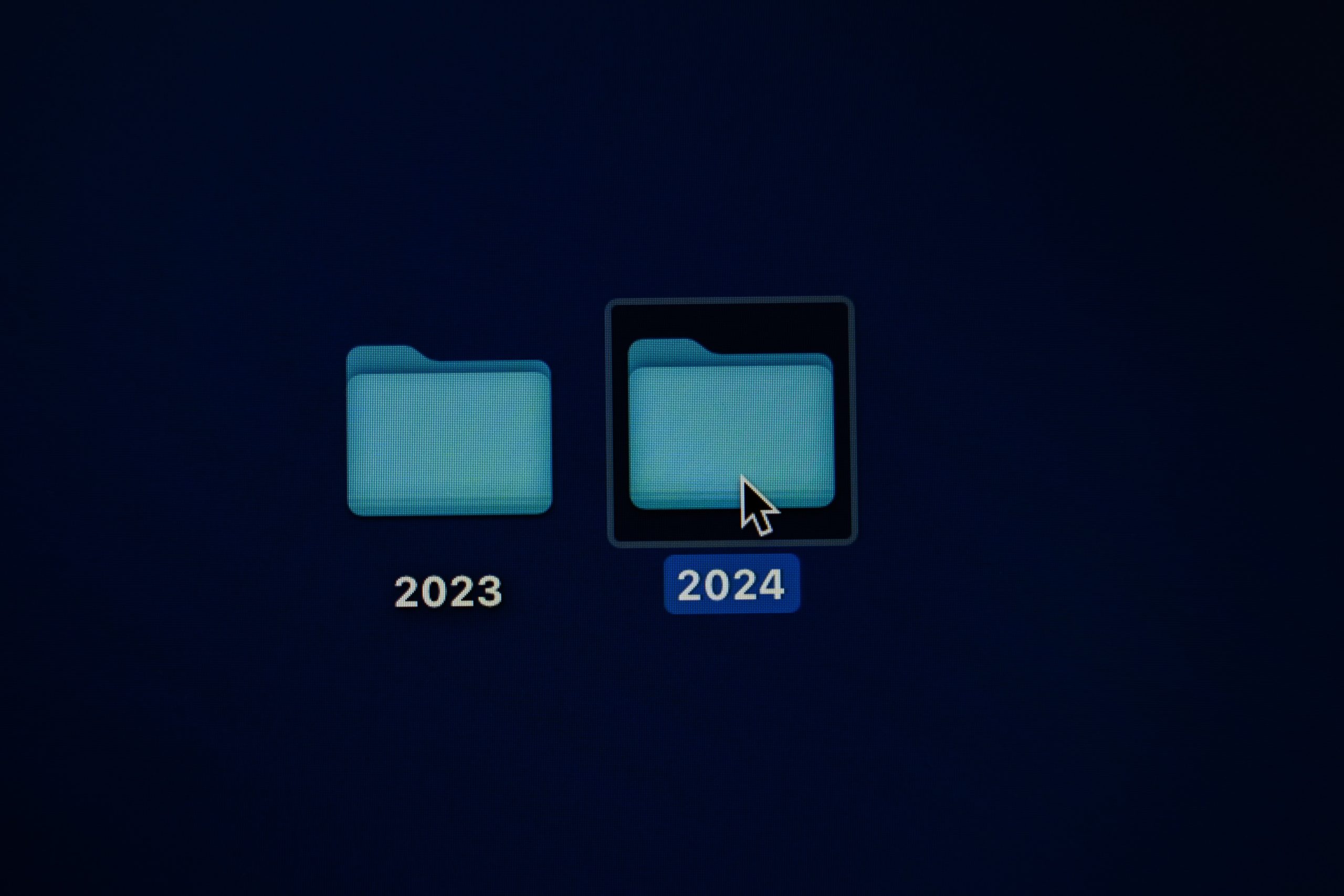 two folders on a desktop, 2023 to 2024