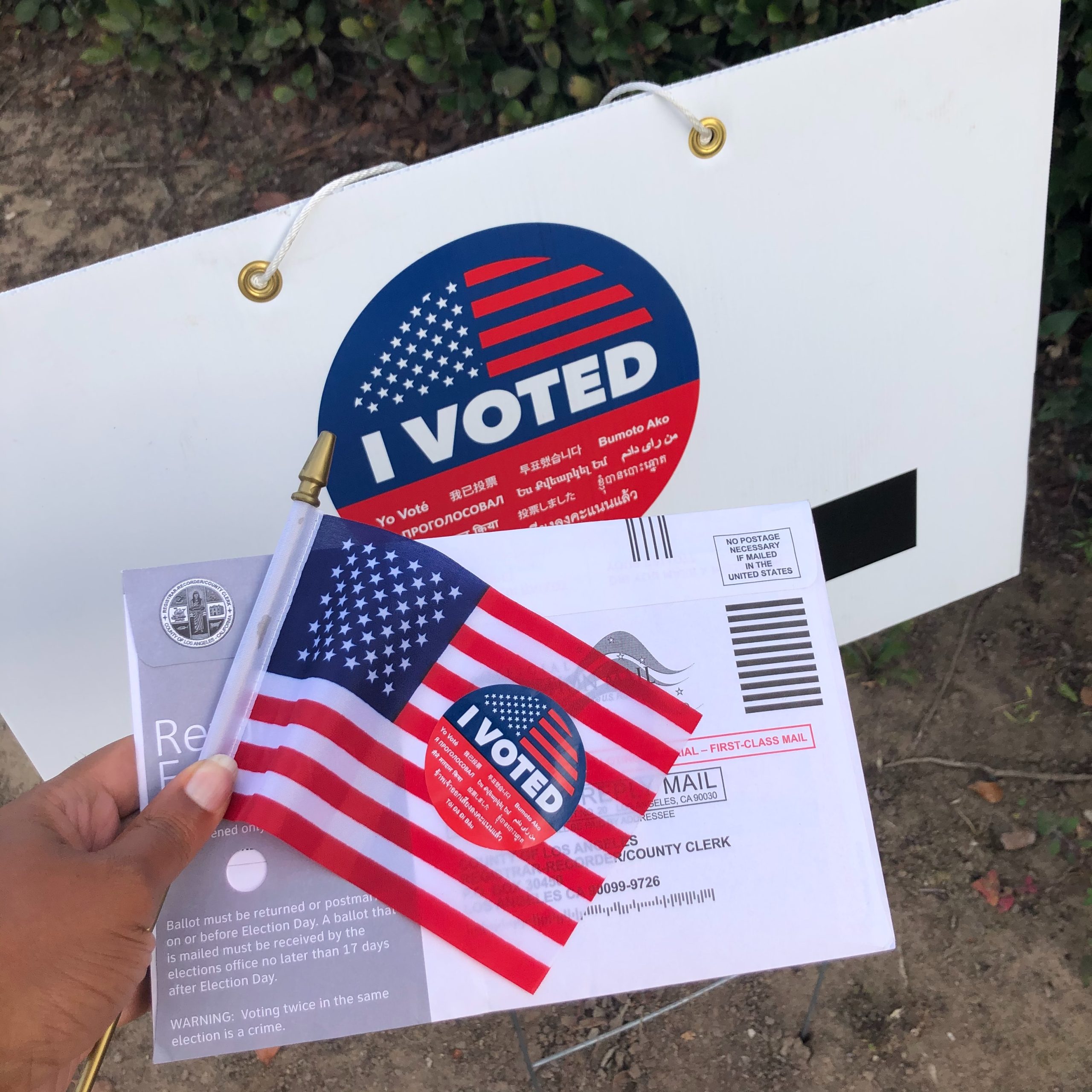 mail-in ballot and american flag